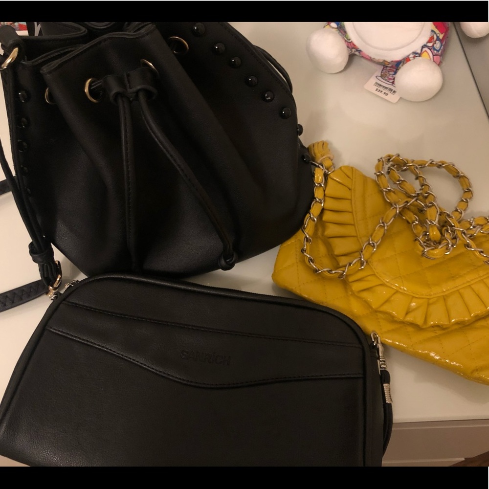 Black bucket bag with 2 additional small bags